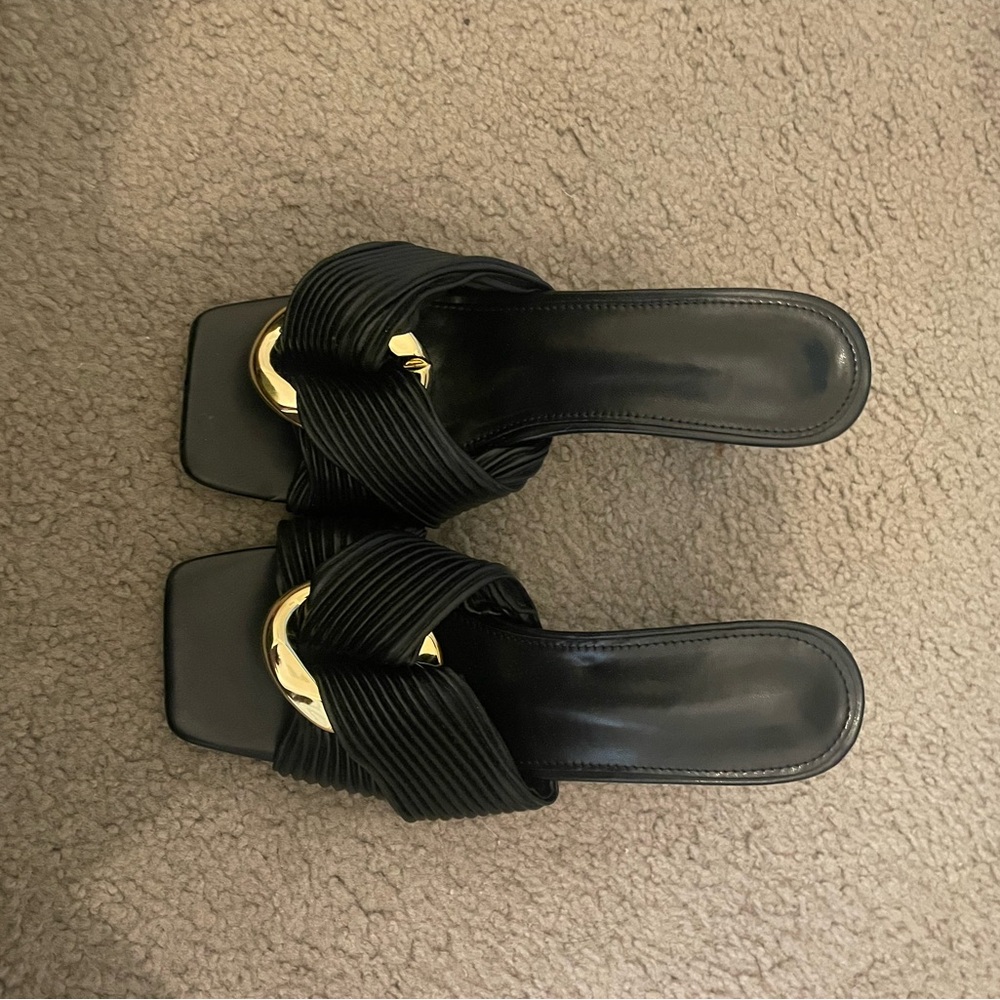 Elegant Black Women's Shoes with Gold Accents